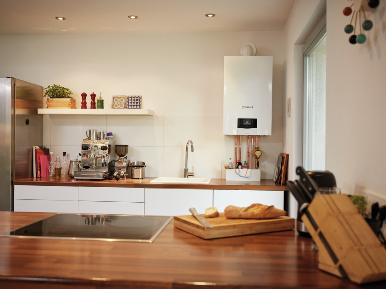 A new gas boiler installed in a kitchen, after landlord obtained a gas safety certificate.